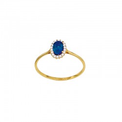 Bague avec oxyde ovale bleu foncé entouré d'oxydes blancs, Or 375/1000