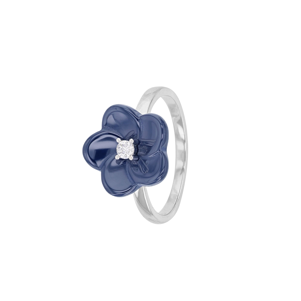 Bague avec une fleur en céramique bleue et un oxyde de zirconium