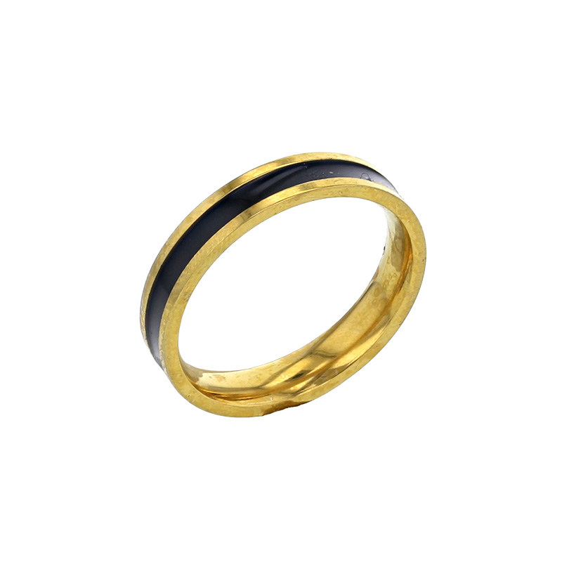Bague fine ornée d'émail blanc en acier doré