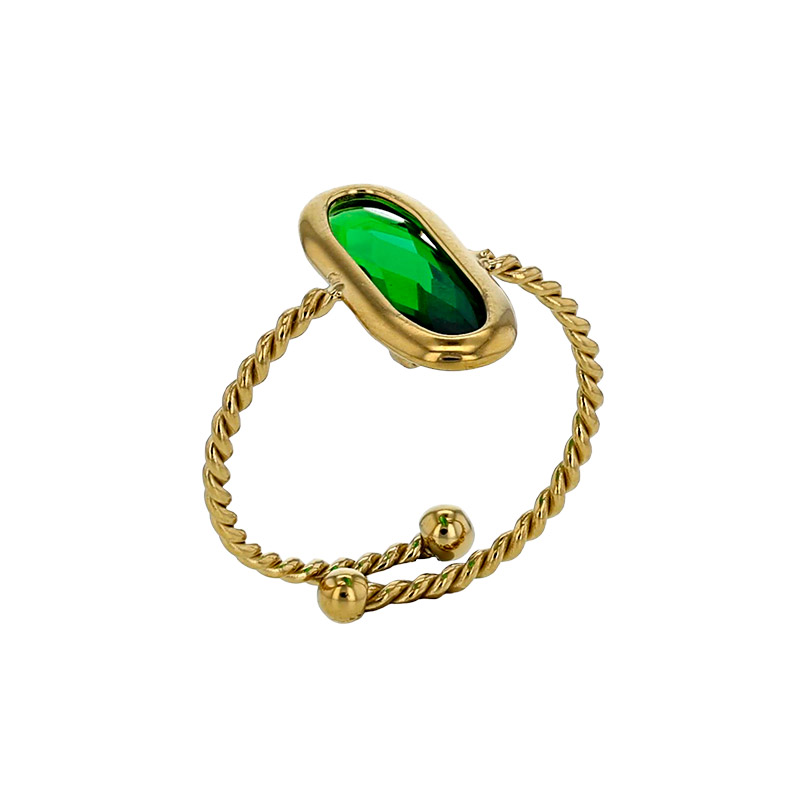 Bague réglable torsadée ornée d'un ovale en verre facetté rouge, acier doré