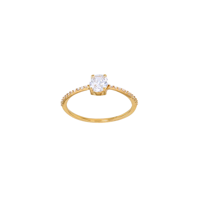 Bague solitaire taille ovale serti 4 griffes, épaulé d'oxydes, Plaqué or