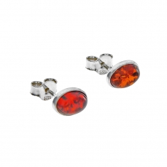 Boucles d'oreilles puces en ambre entourées d'une armature en argent 925/1000