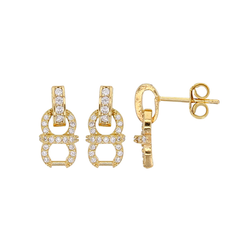 Boucles d’oreilles fantaisie forme huit ornées d’oxydes, en argent 925/1000 doré