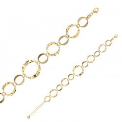 Bracelet cercles martelés et lisses, fermoir menotte en argent 925/1000 doré
