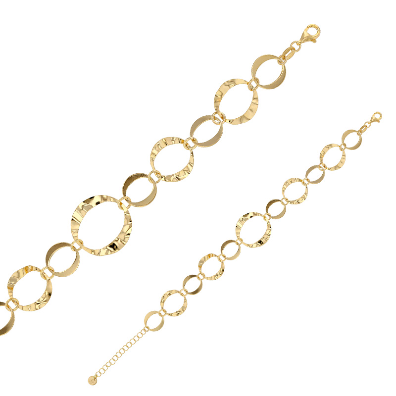 Bracelet cercles martelés et lisses, fermoir menotte en argent 925/1000 doré