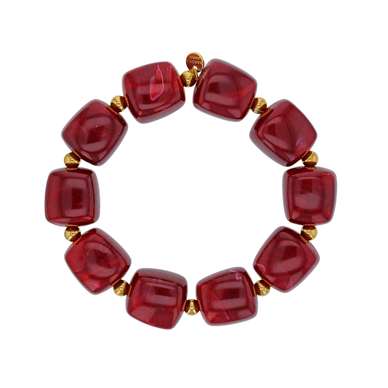 Bracelet élastique orné de cubes en résine rouge et perles dorées, acier doré