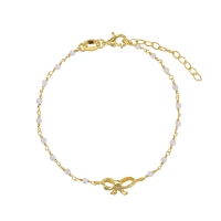 Bracelet motif noeud et perles de culture d'eau douce, argent doré 925/1000