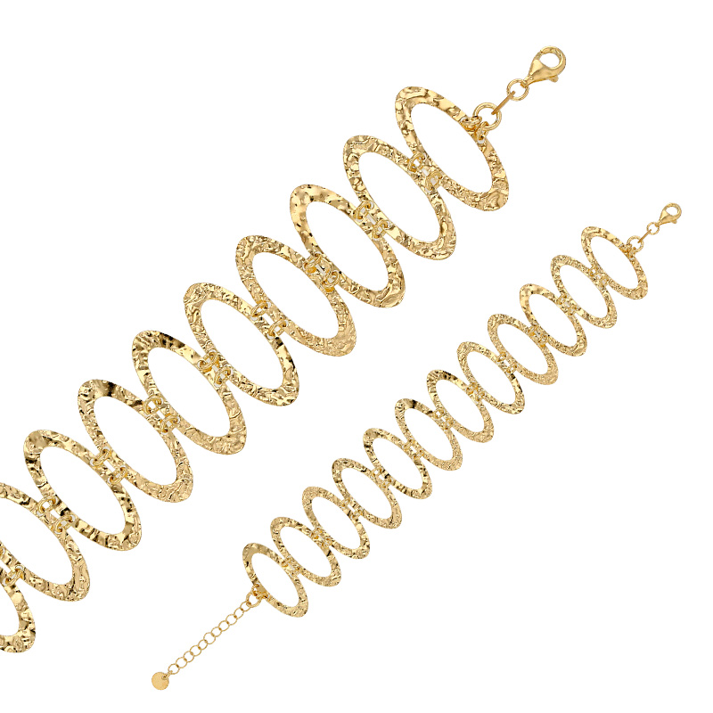 Bracelet ovales martelés maille fantaisie, fermoir menotte, argent 925/1000 doré