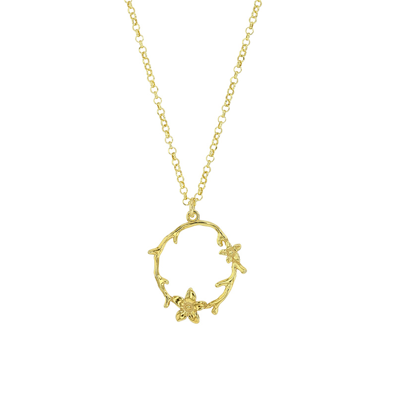 Collier fleurs sur un cercle argent 925/1000 doré
