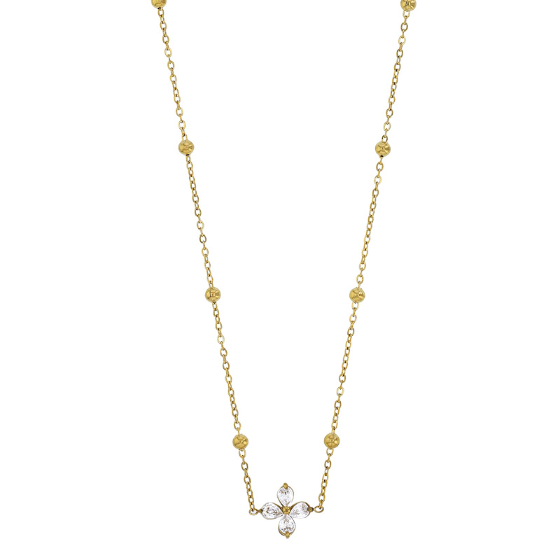 Collier orné d'un pendentif fleur avec oxydes et boules en acier doré