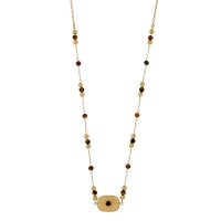 Collier orné de fluorites et résine vertes, acier doré