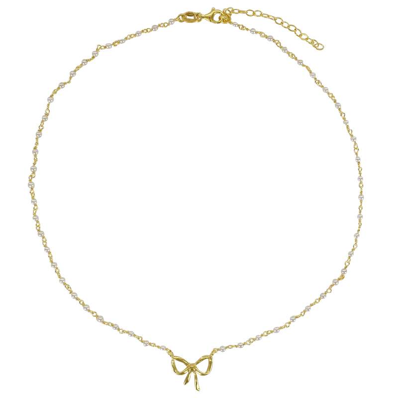 Collier orné de perles de culture d'eau douce, motif noeud en argent 925/1000 doré