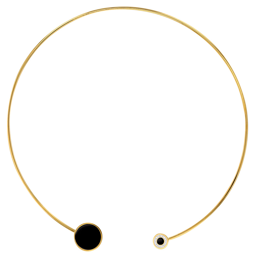 Collier torque acier doré agrémenté de ronds en émail noir dont 1 orné de cristaux
