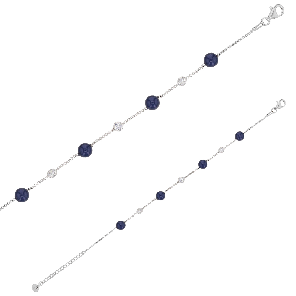 Bracelet avec perles synthétiques bleu et oxydes de zirconium sertis en argent 925/1000 rhodié