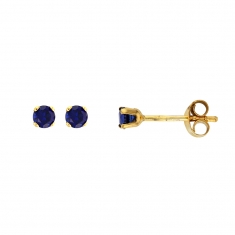 Boucles d'oreilles Or 375/1000 avec pierre synthétique bleu saphir
