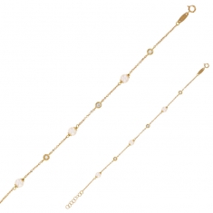 Bracelet Or 375/1000 orné de perles de culture d'eau douce et d'oxydes de zirconium