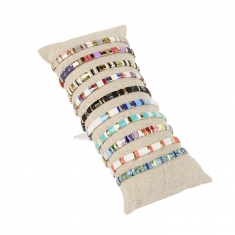 10 bracelets élastiques en perles de verre et hématite fournis avec coussin en lin