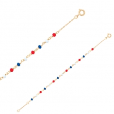Bracelet orné de perles en verre teinté bleu, blanc et rouge facetté, plaqué or