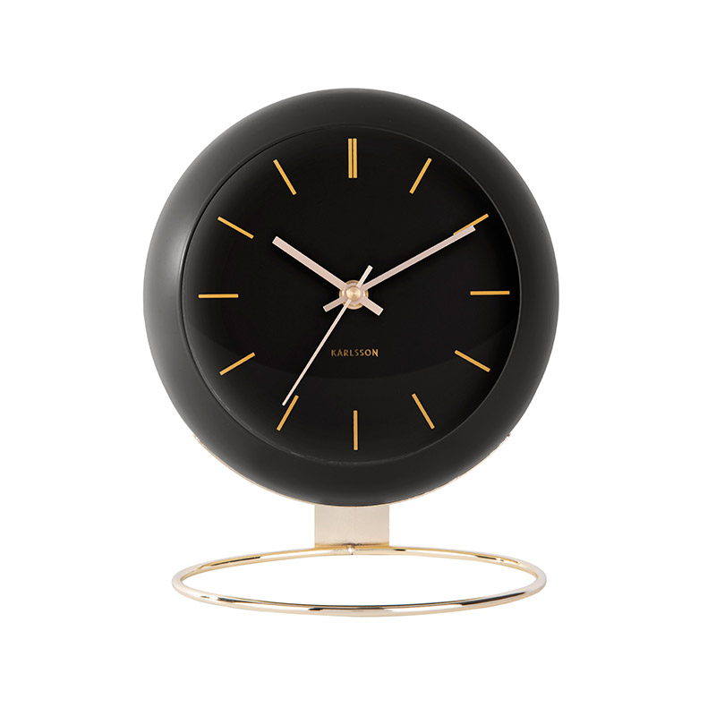 Horloge en forme de globe noir à poser, pied métal doré