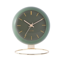 Horloge en forme de globe noir à poser, pied métal doré