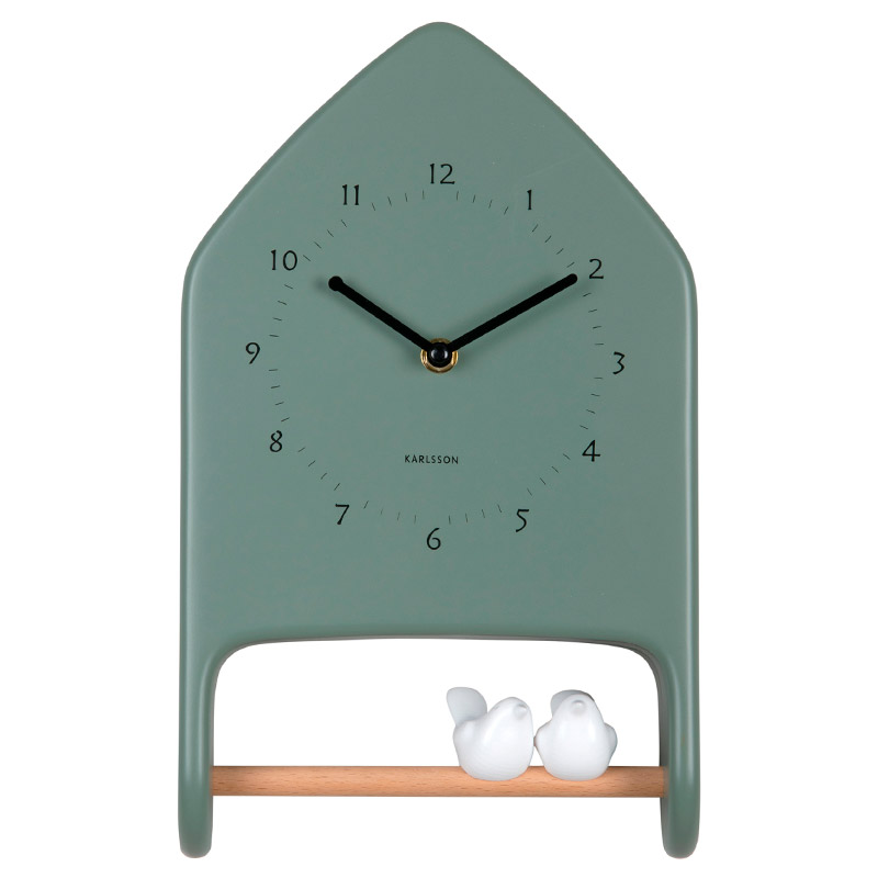 Horloge murale forme maison beige avec 2 oiseaux sur un perchoir en bois