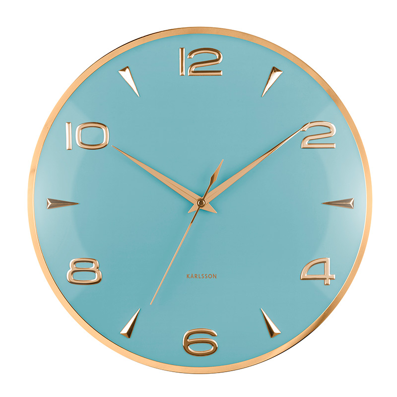 Horloge rétro en métal noir, index et contour dorés