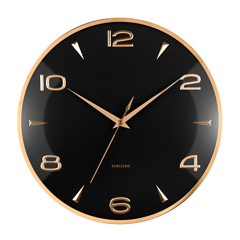 Horloge rétro en métal noir, index et contour dorés