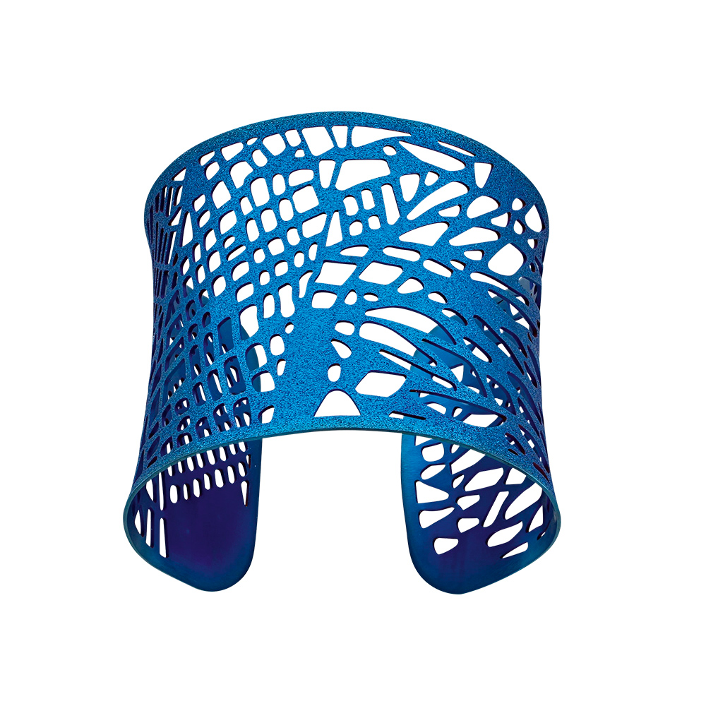Manchette ajourée motif feuille en acier bleu