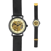 Montre automatique noire, cadran et squelette dorés, pierres synthétiques, bracelet milanais