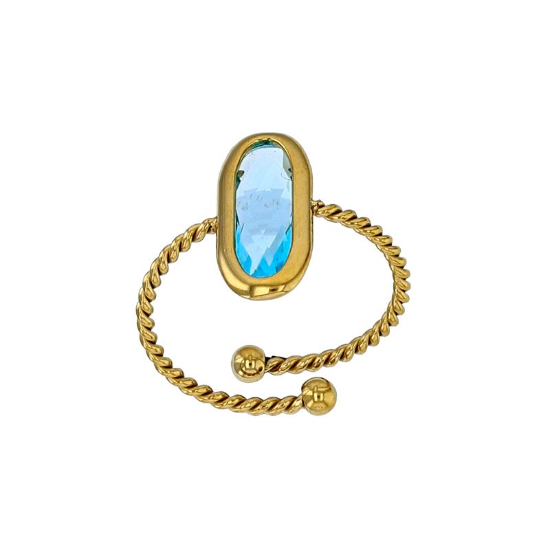 Bague réglable torsadé orné d'un ovale en verre facetté rouge, acier doré