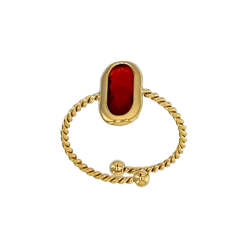 Bague réglable torsadé orné d'un ovale en verre facetté rouge, acier doré