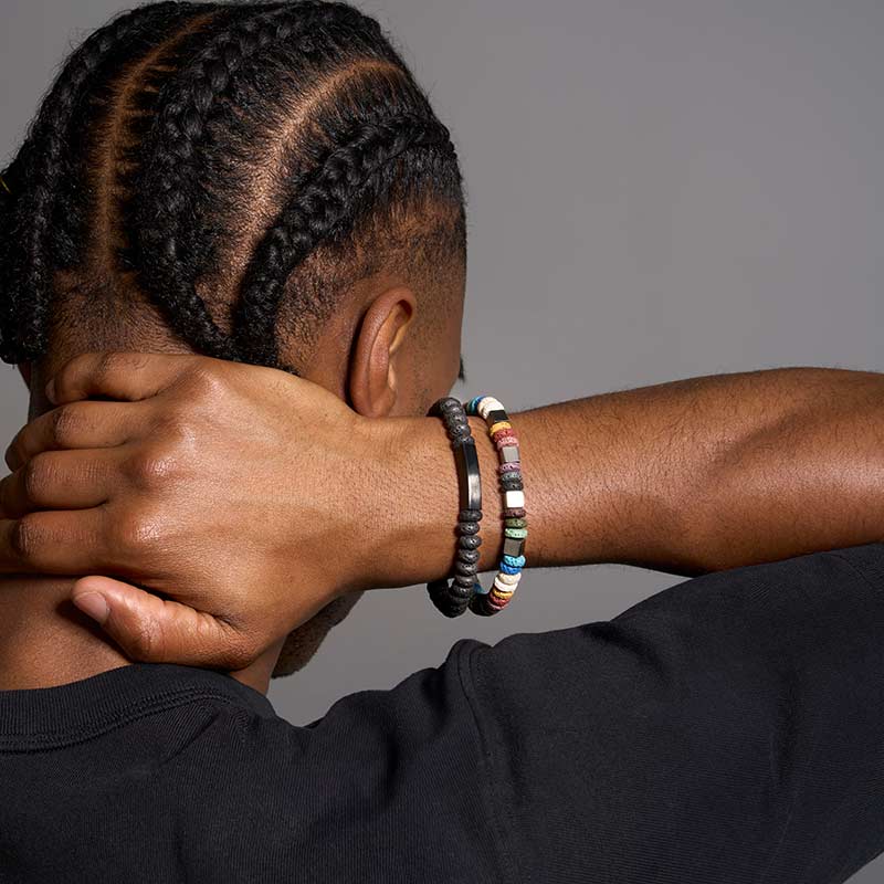 Bracelet élastique, tube en acier et pierres de lave noires