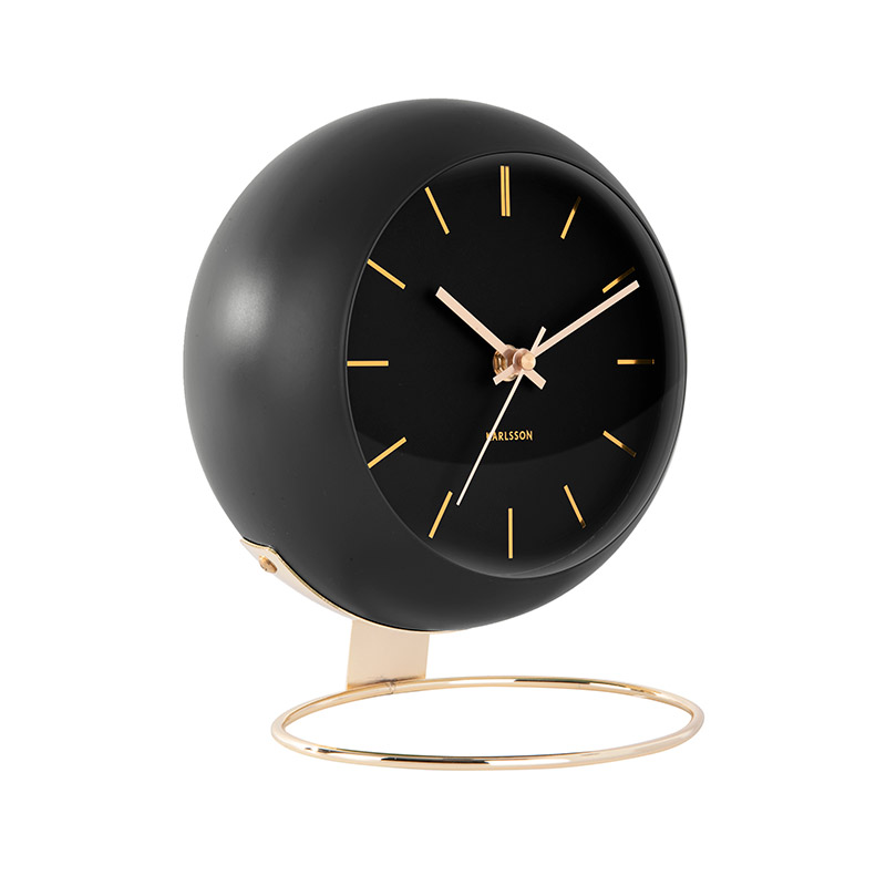Horloge en forme de globe noir à poser, pied métal doré