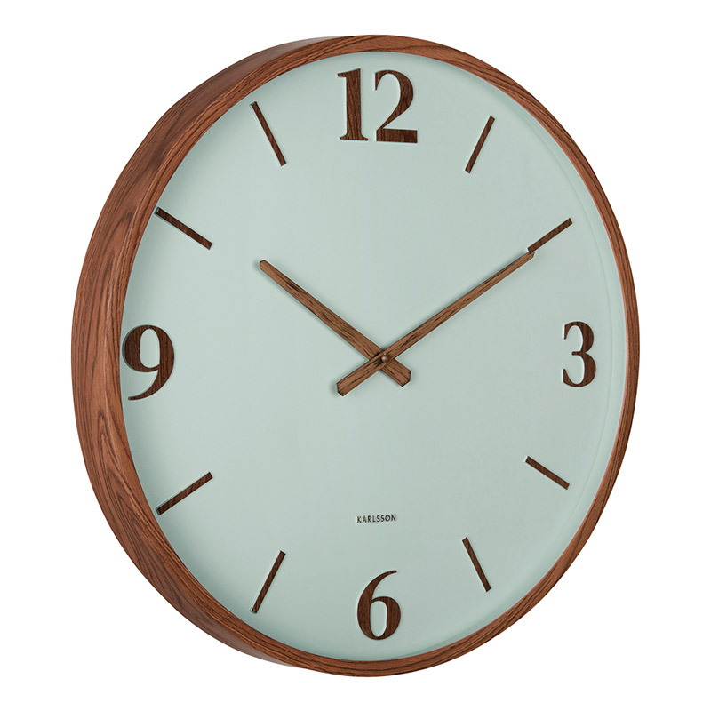 Horloge murale couleur bois et cadran vert pâle