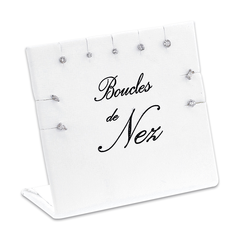 Présentoir 9 boucles nez en Or blanc 750/1000 avec oxydes de zirconium: 5 griffes et 2 sertis clos
