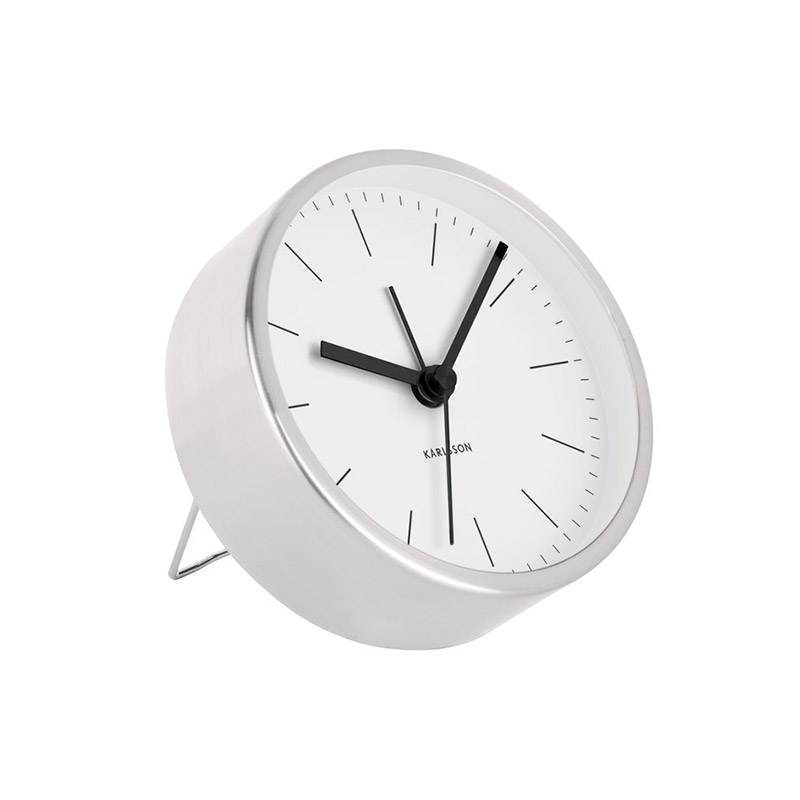 Réveil métal couleur argent et cadran blanc sur pied incliné