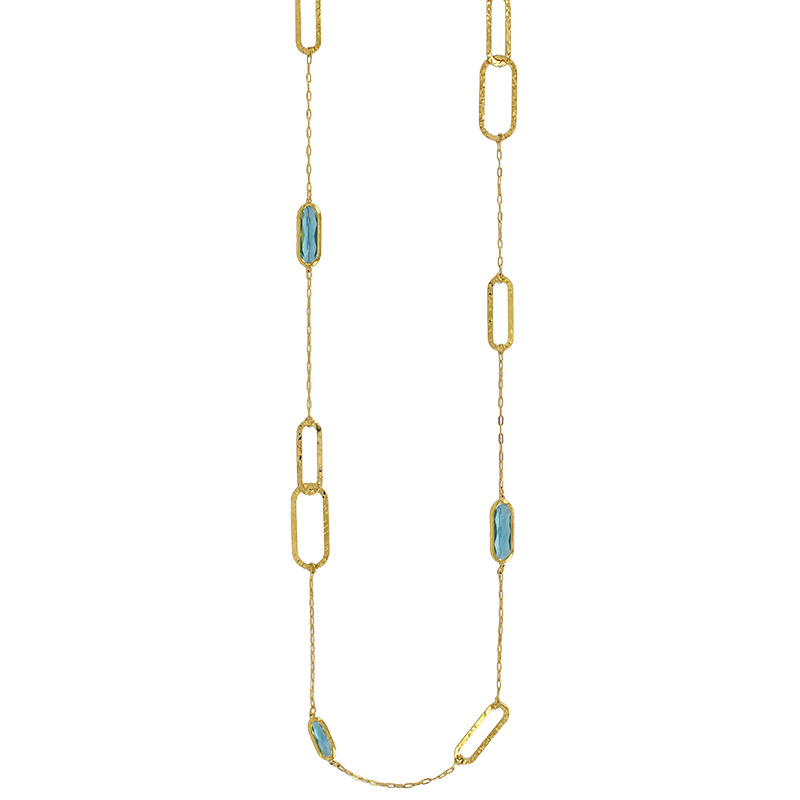 Sautoir motif ovales martelés et en verre facetté bleu clair, acier doré