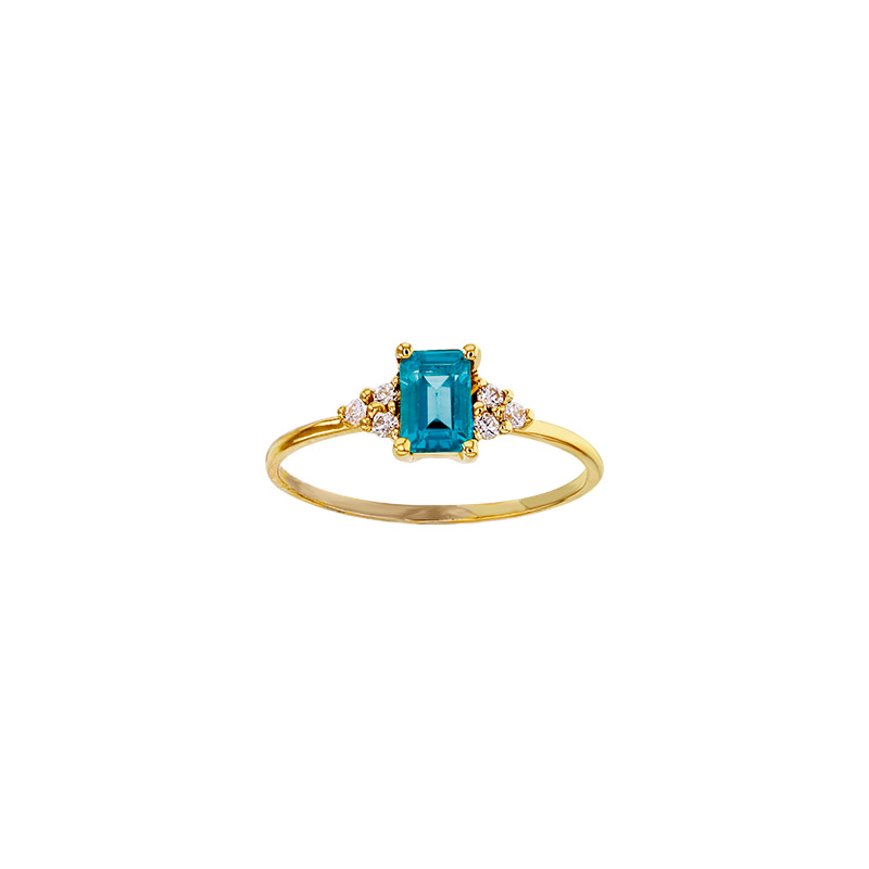 Solitaire Topaze London Blue taille rectangle 6 x 4mm, 6 diamants 0,09ct GVS Or 750/1000